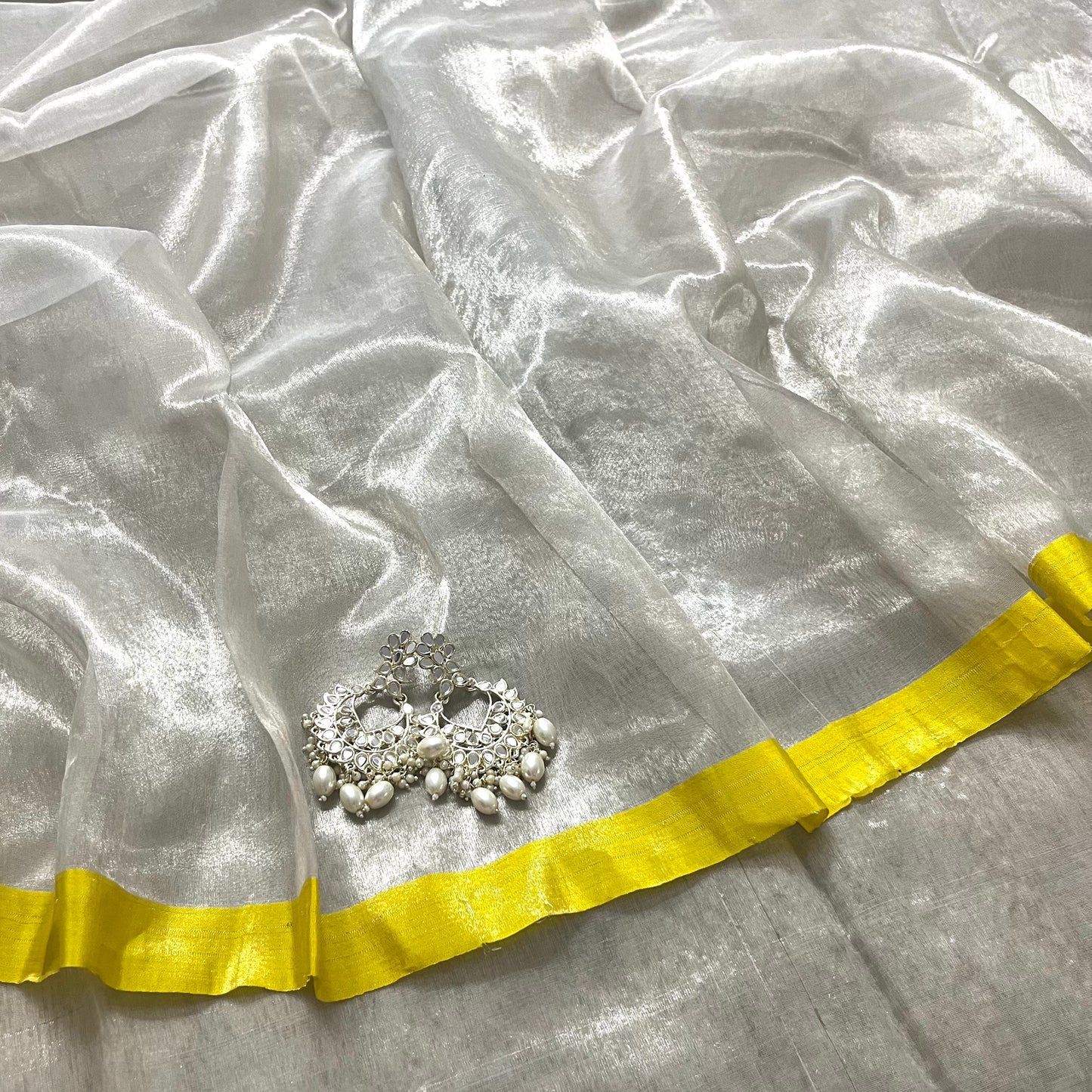 (Shop the look) Silver white and lemon chanderi tissue silk saree