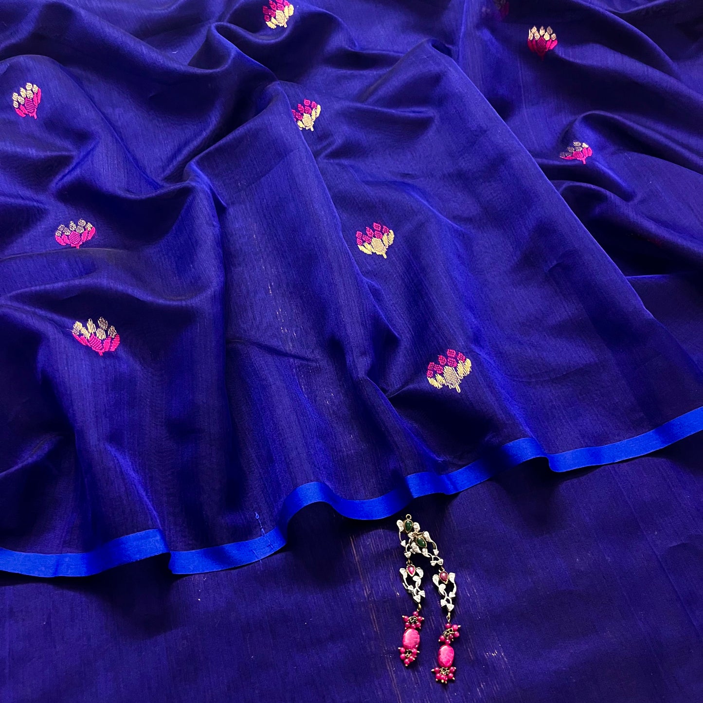 Dark blue and pink maheshwari saree with flower motifs all over