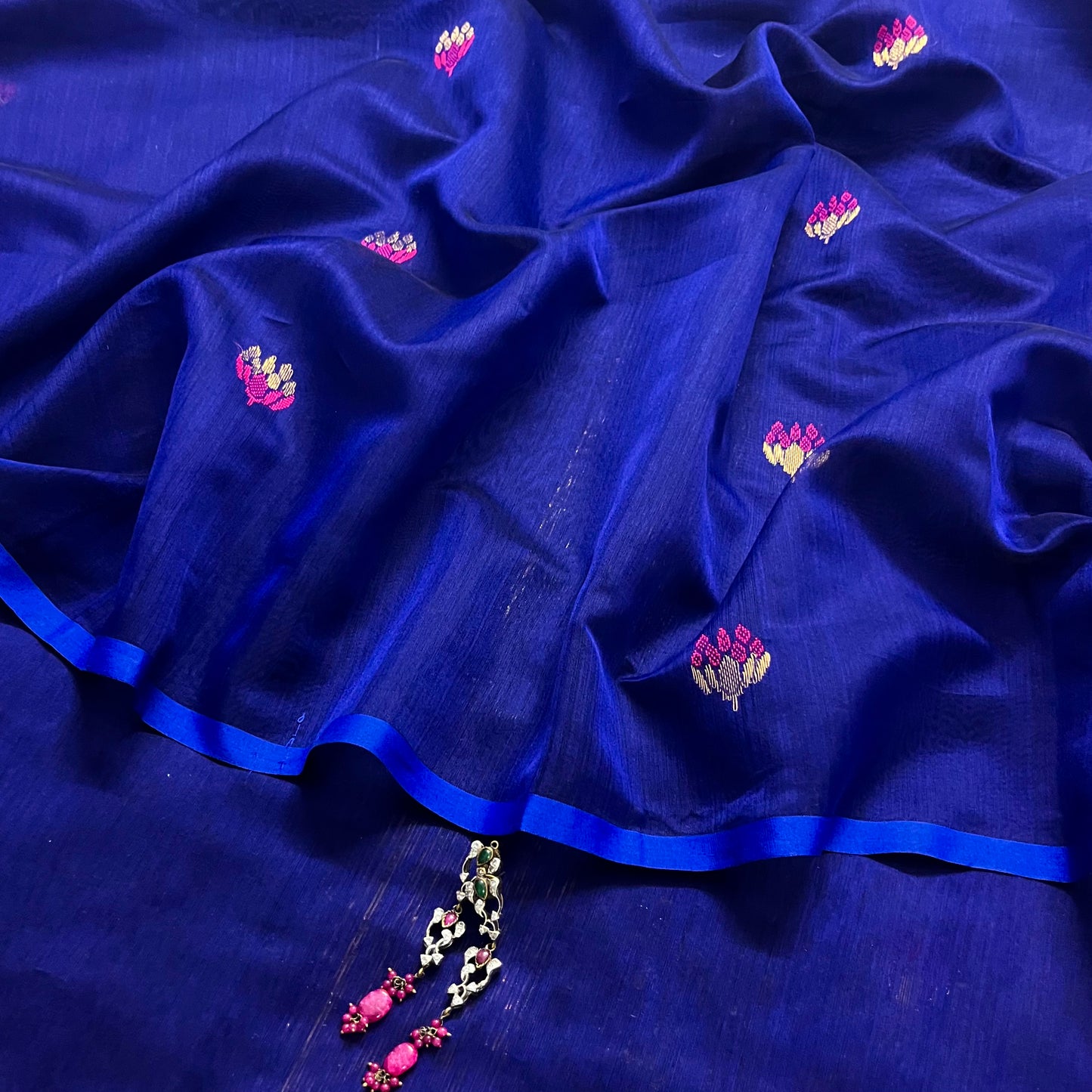 Dark blue and pink maheshwari saree with flower motifs all over