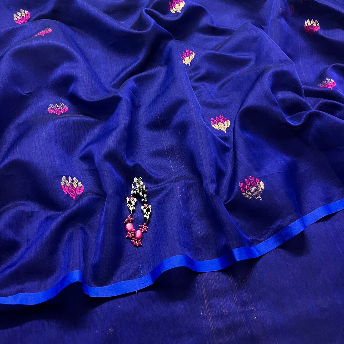 Dark blue and pink maheshwari saree with flower motifs all over