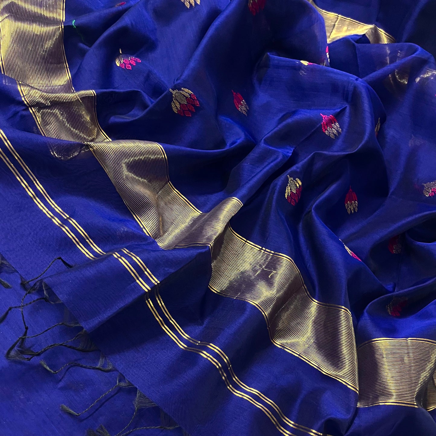 Dark blue and pink maheshwari saree with flower motifs all over