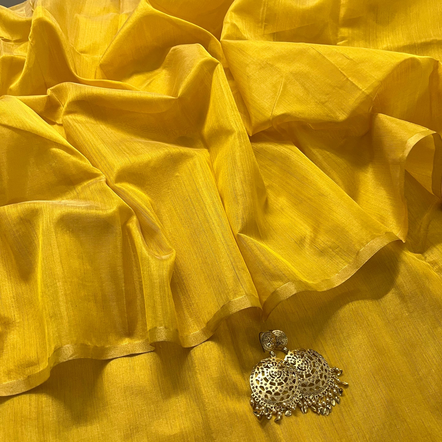 Yellow maheshwari tissue silk saree with zari lines on pallu