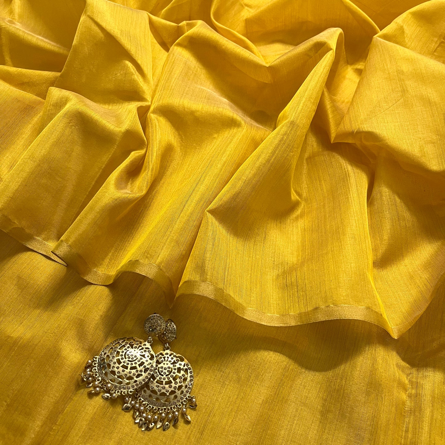 Yellow maheshwari tissue silk saree with zari lines on pallu