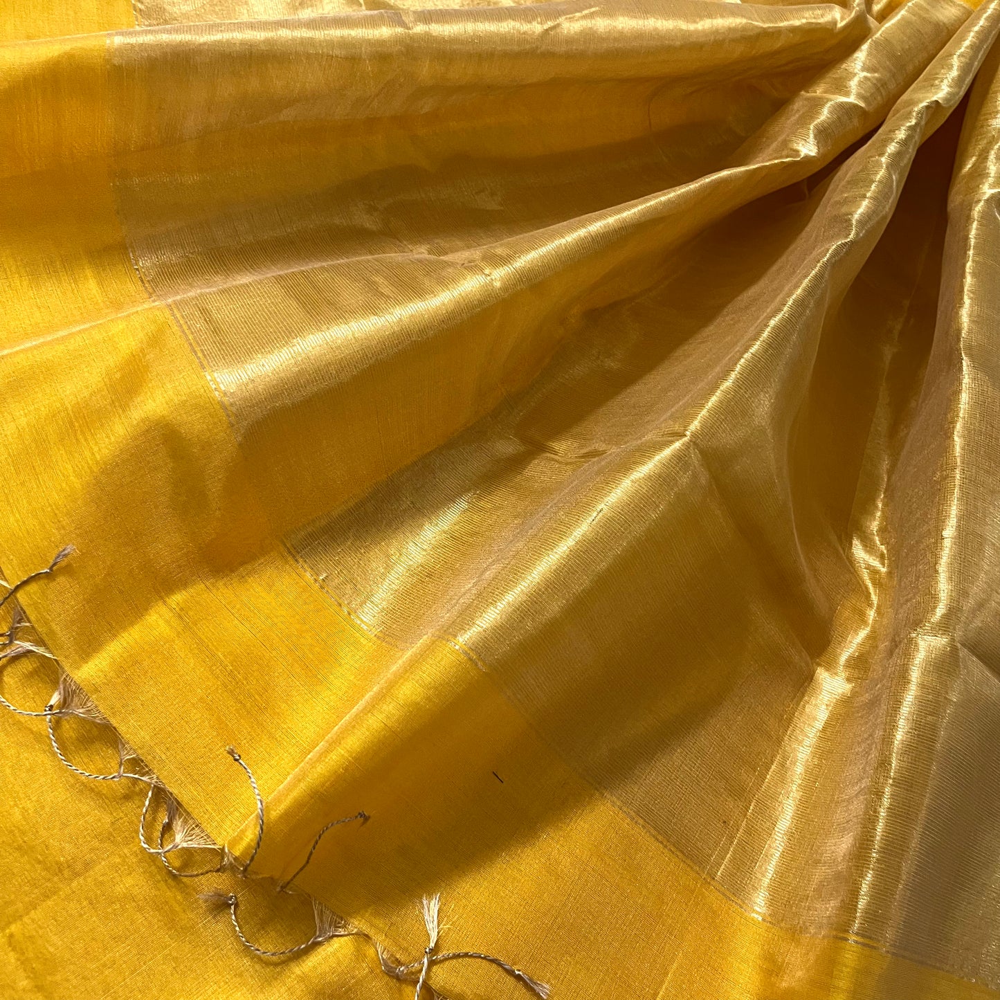 Yellow maheshwari tissue silk saree with zari lines on pallu