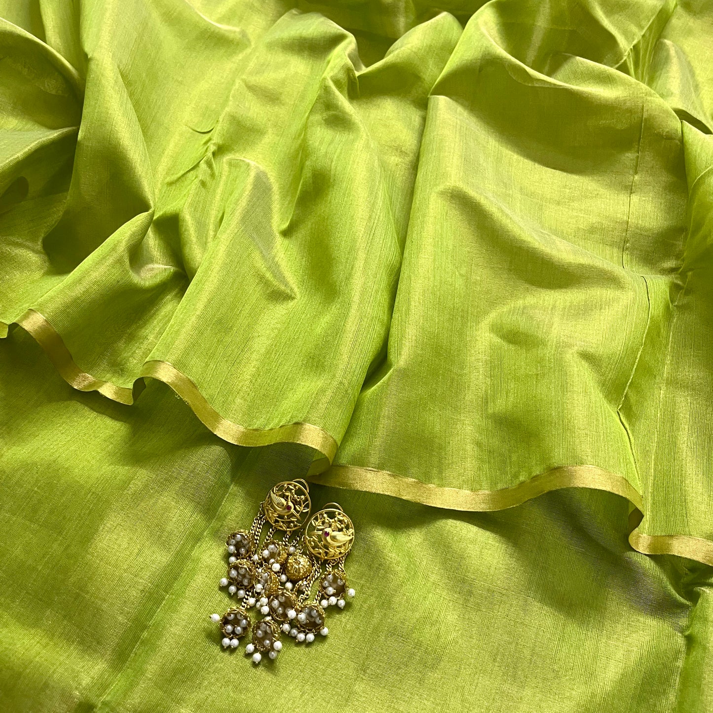 Moss green maheshwari tissue silk saree with zari lines on pallu