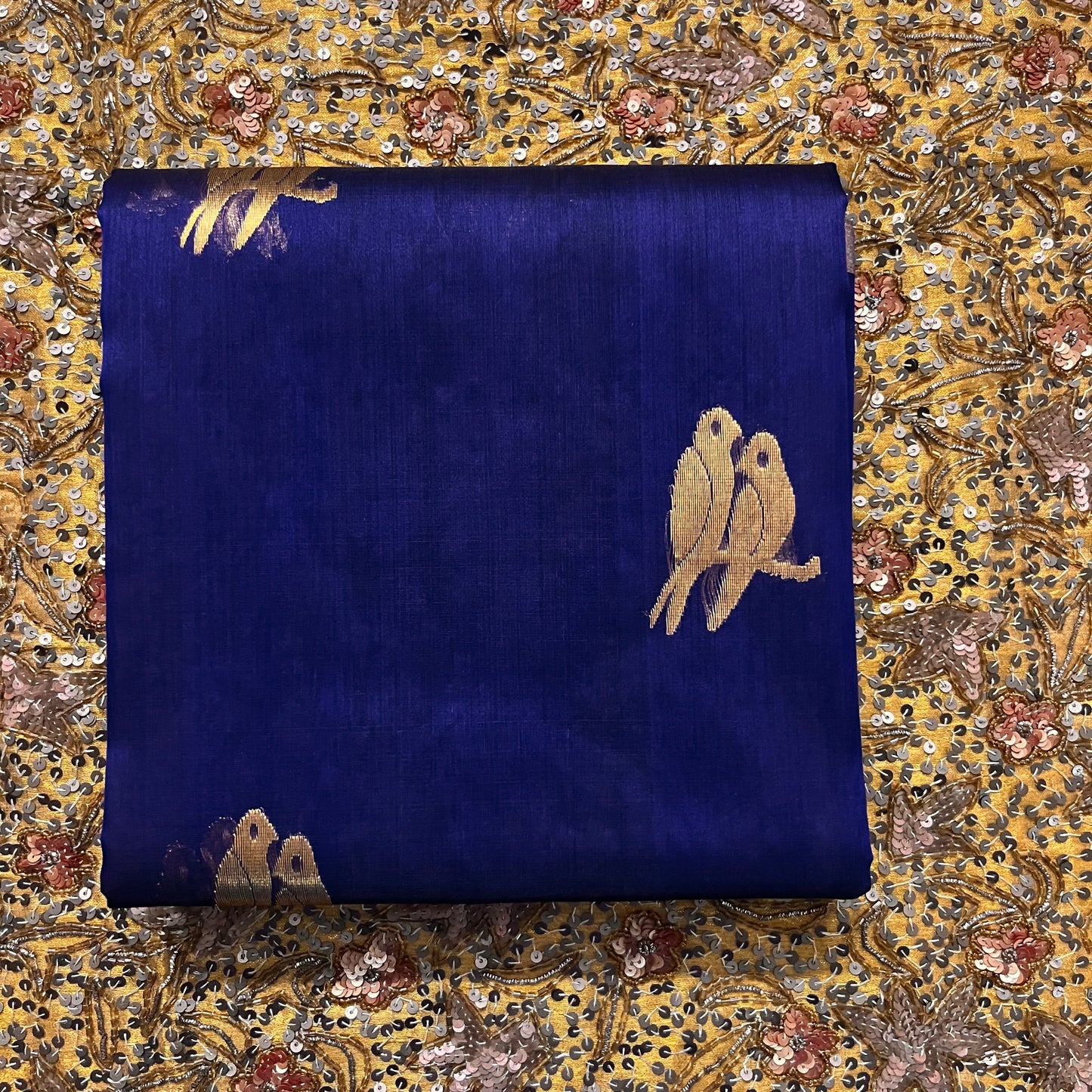 Midnight blue chanderi organza silk saree with bird motifs all over