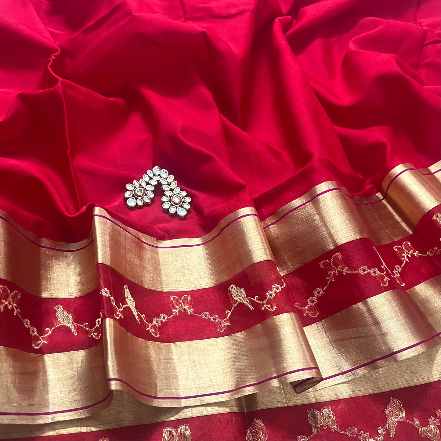 Red chanderi saree with bird motifs border