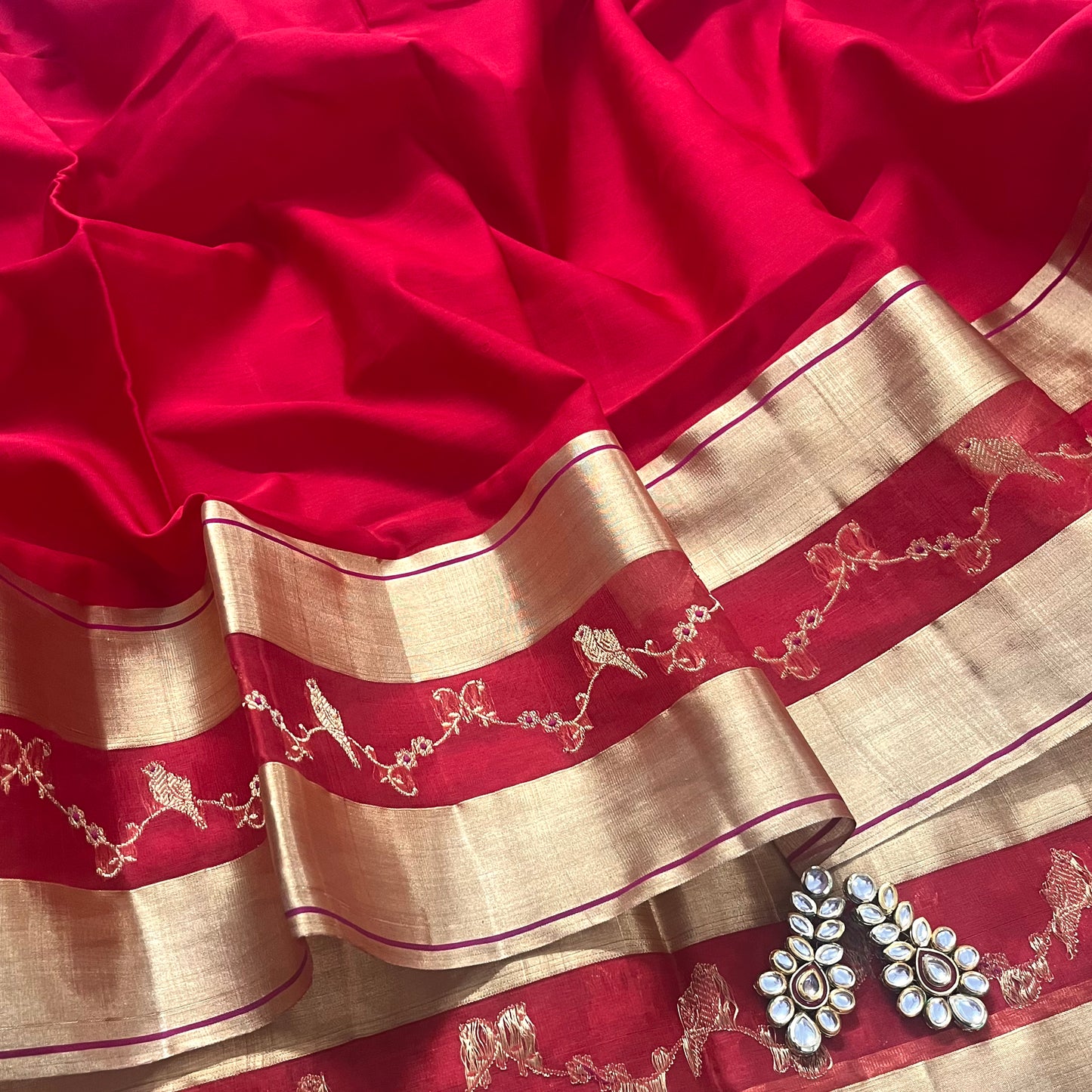 Red chanderi saree with bird motifs border