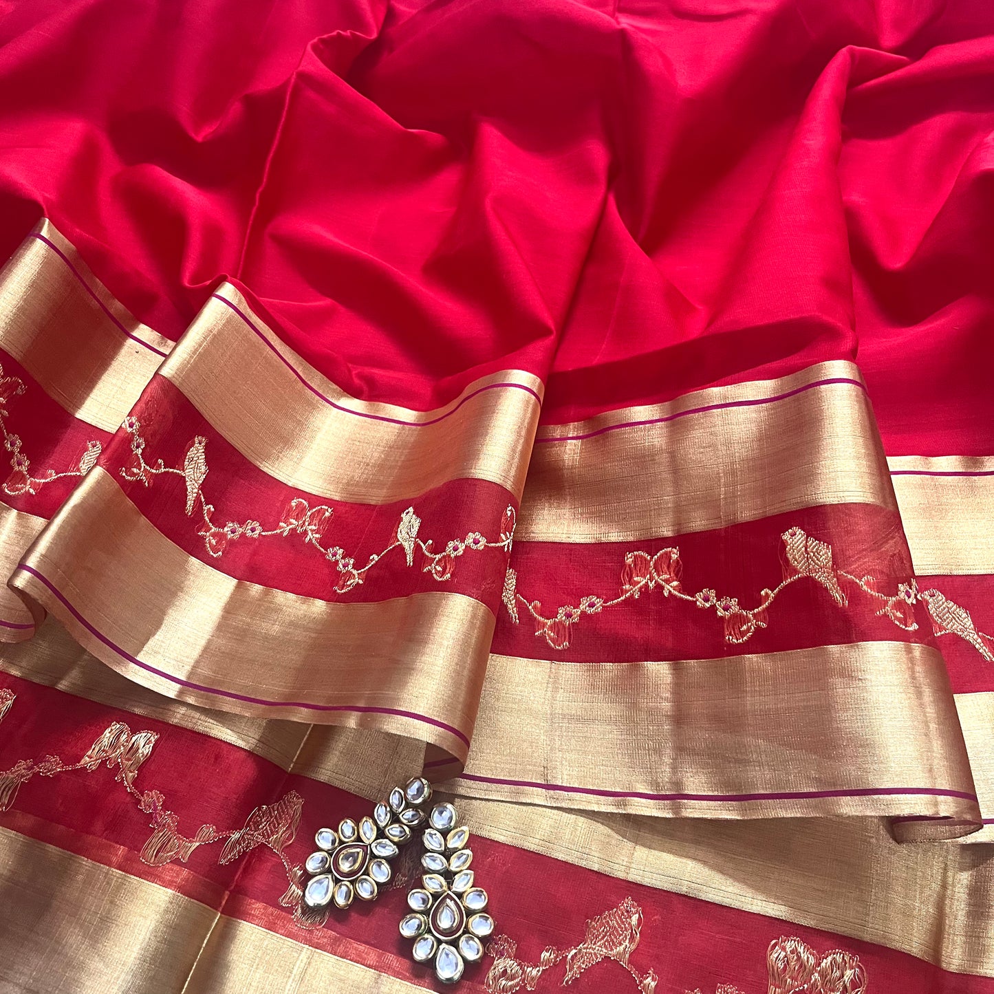 Red chanderi saree with bird motifs border