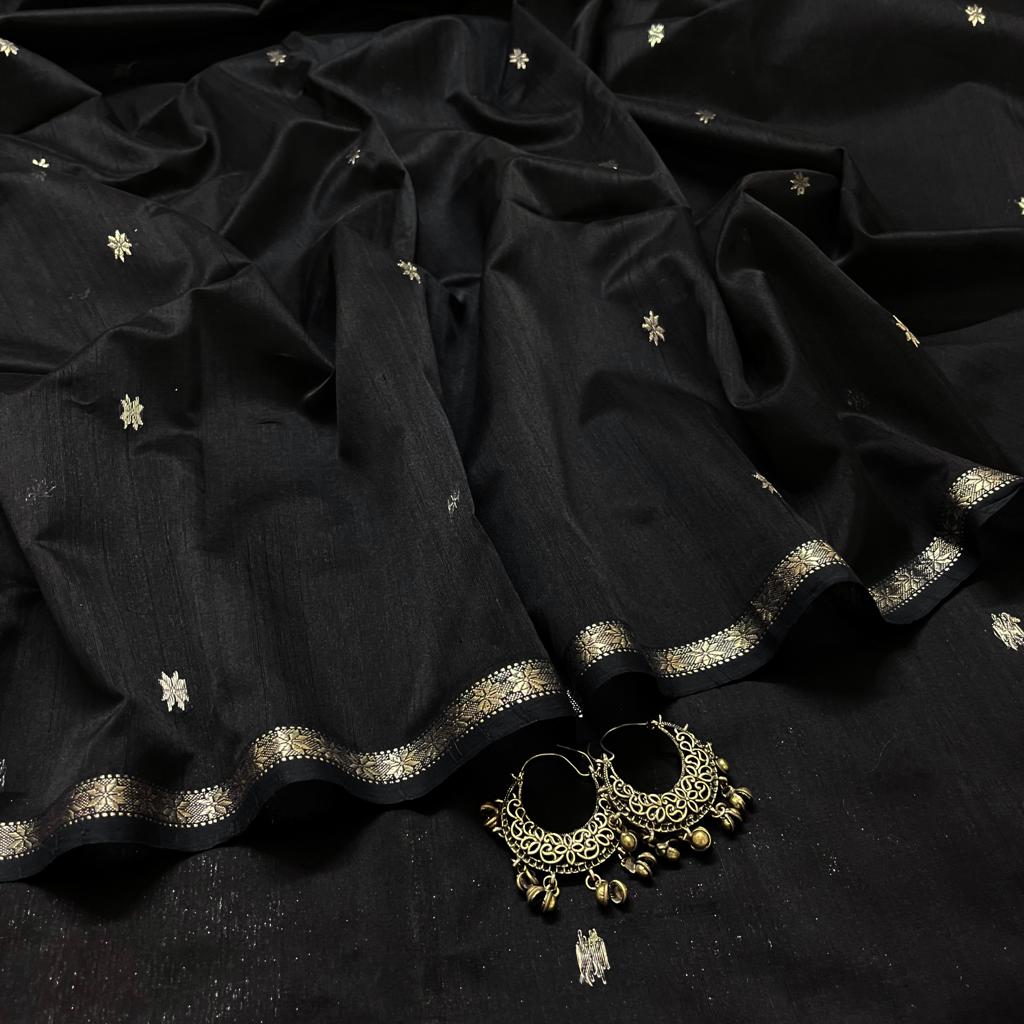 Black and silver maheshwari saree with flower bootis all over