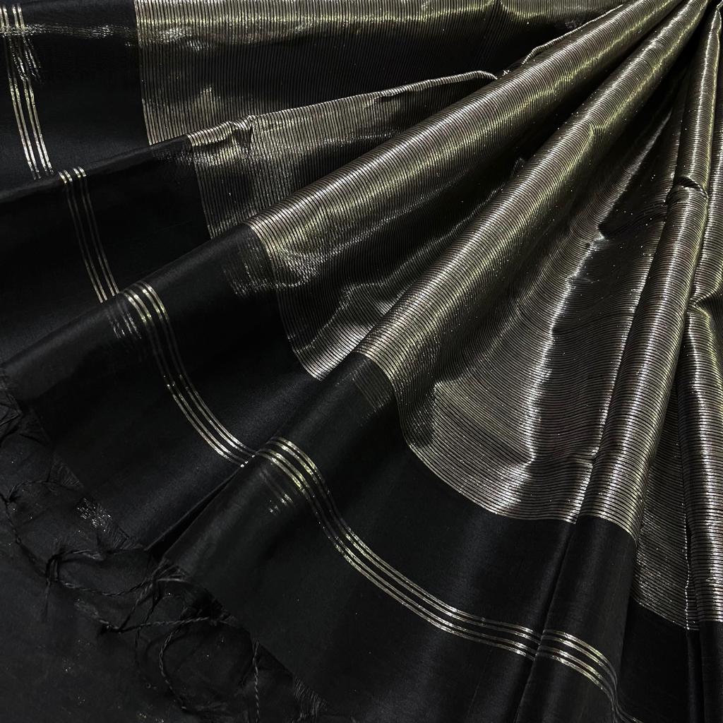 Black and silver maheshwari saree with flower bootis all over