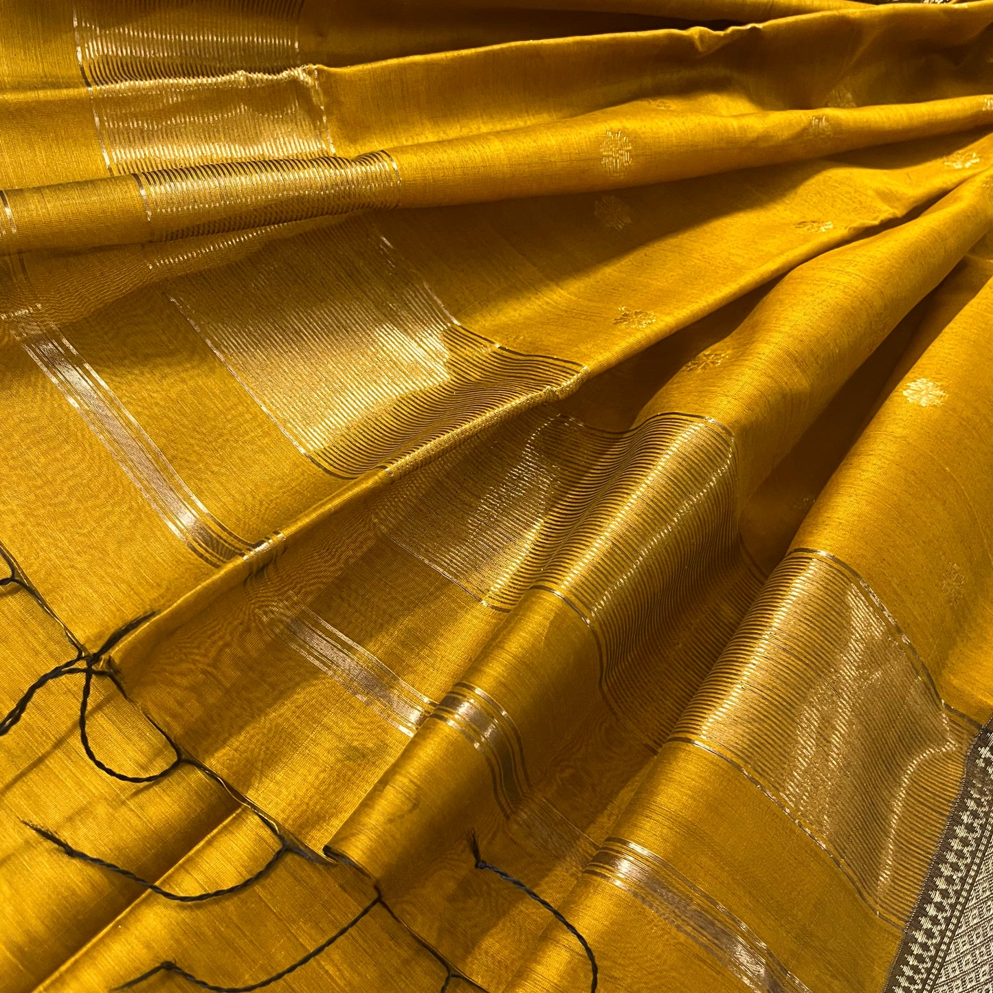 Mustard maheshwari saree with flower bootis all over