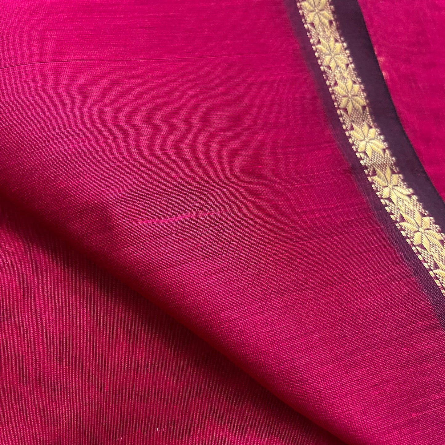 Deep pink maheshwari saree with flower bootis all over