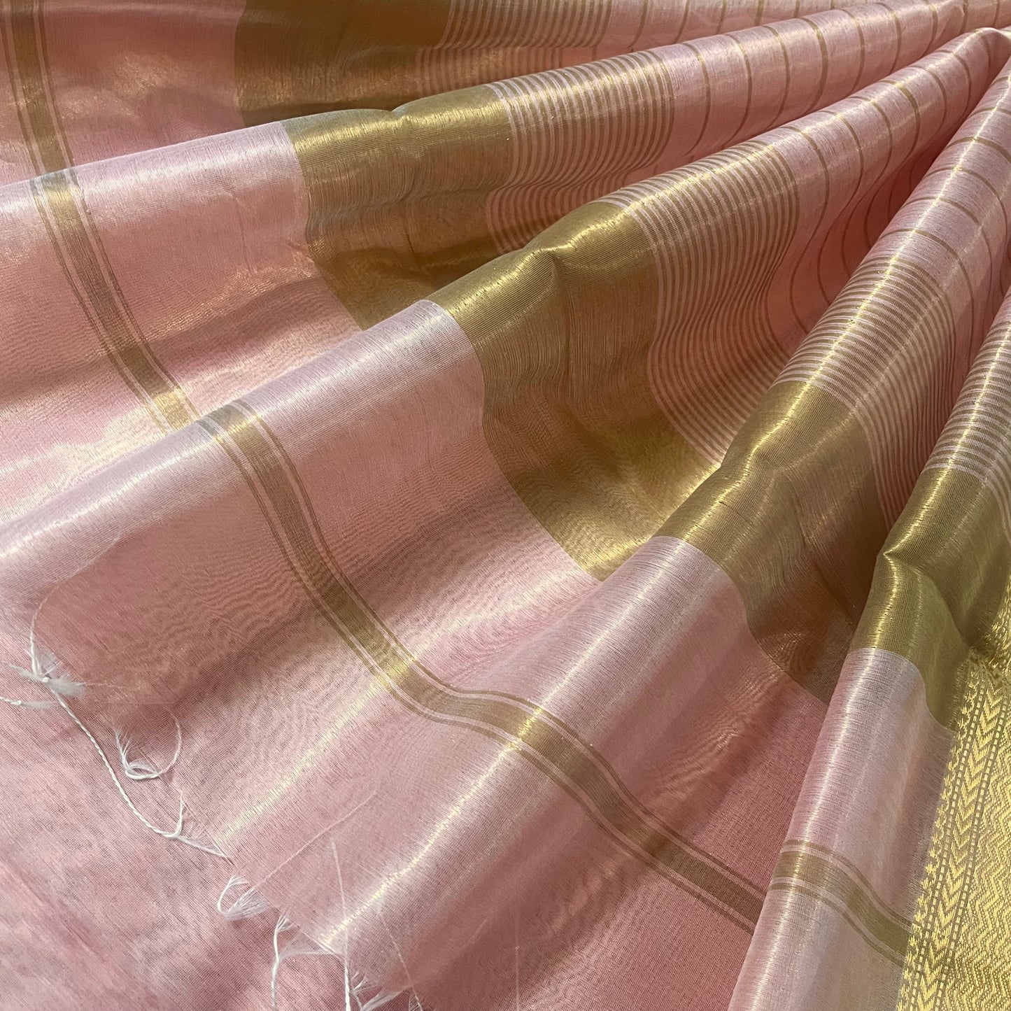 Peachish pink maheshwari tissue silk saree with zari pattern on pallu