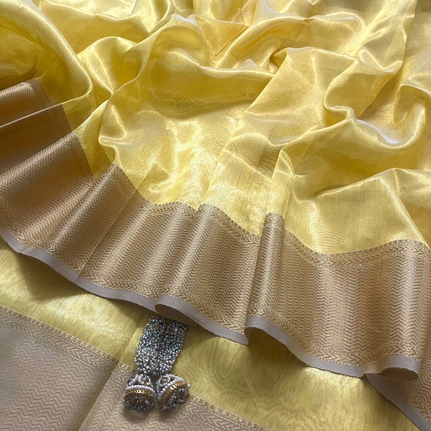 Butter yellow maheshwari tissue silk saree with zari pattern on pallu