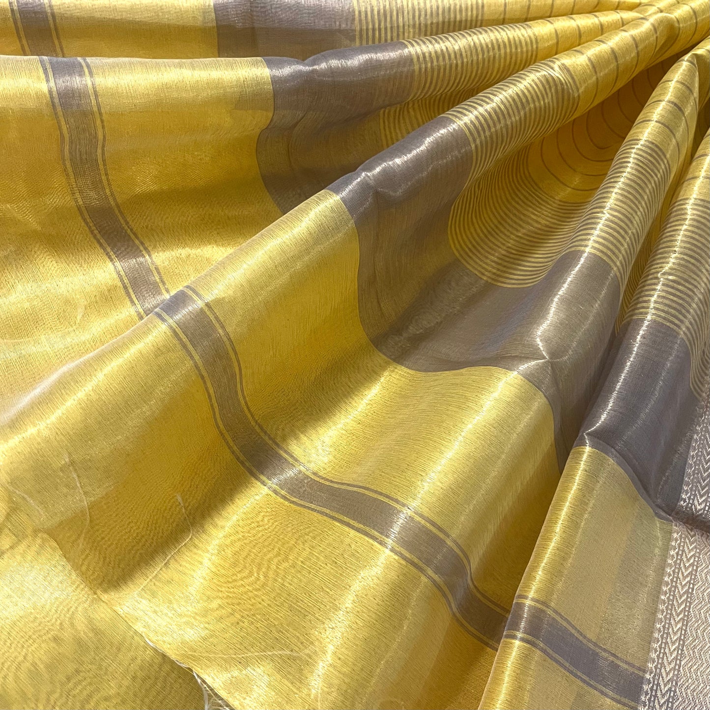 Butter yellow maheshwari tissue silk saree with zari pattern on pallu