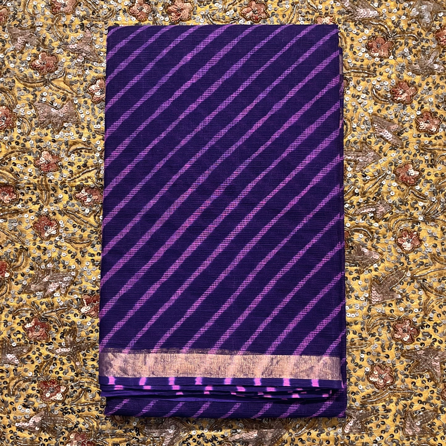 Purple kota checks lehariya saree with zari border