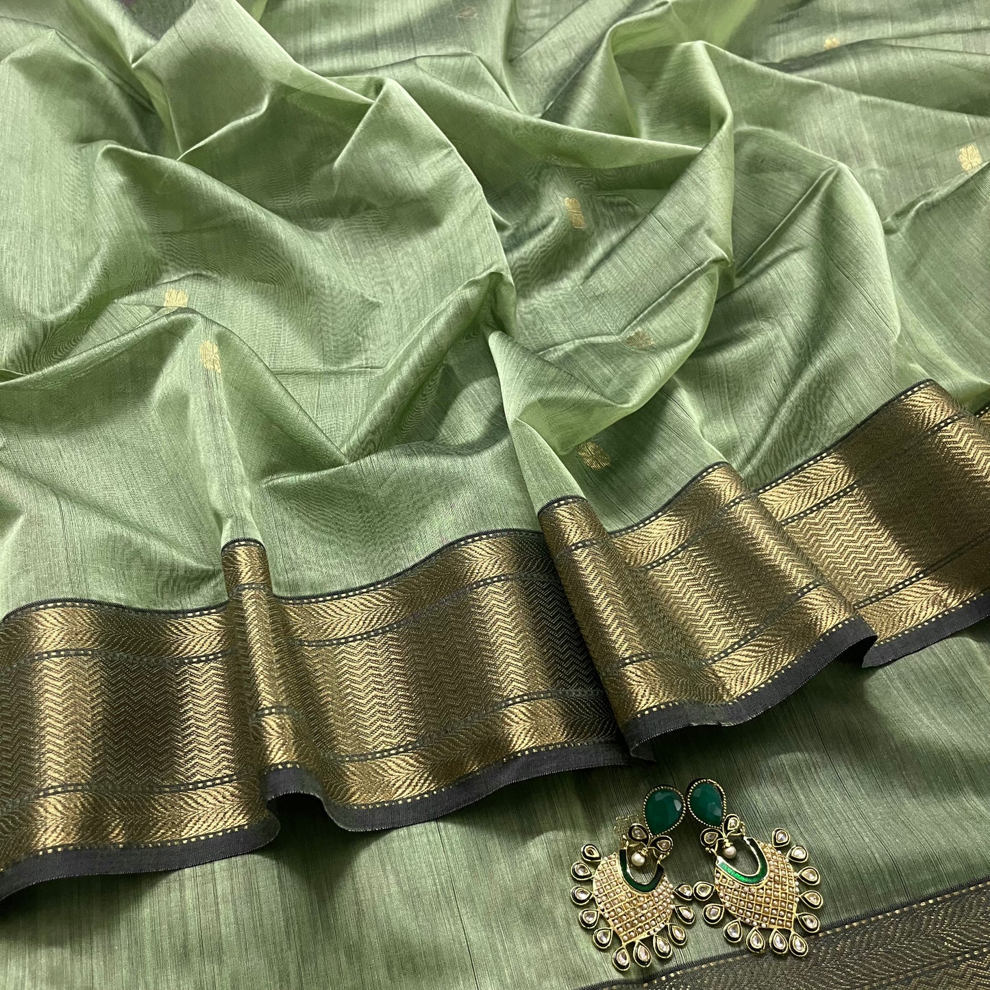 Green maheshwari saree with Paisley motifs on pallu