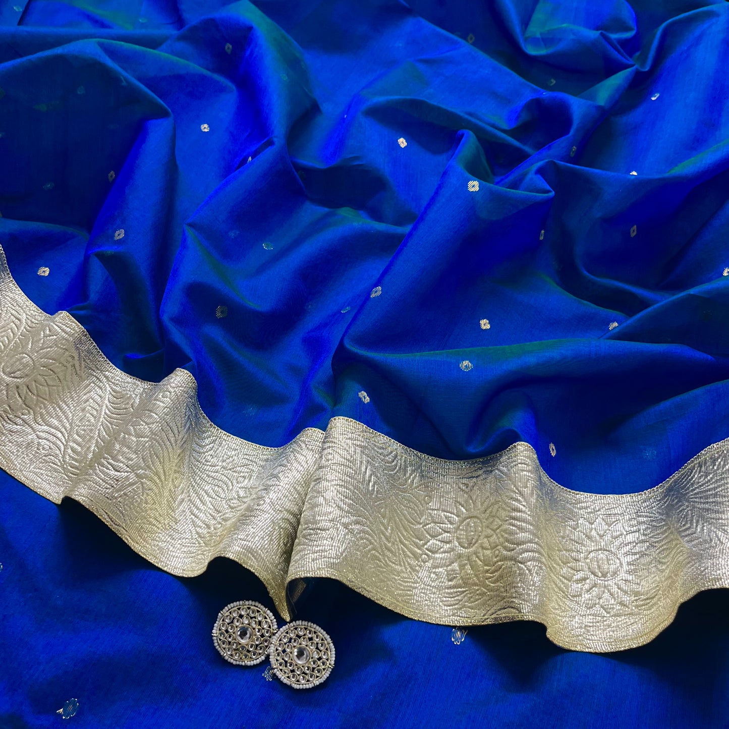 Peacock blue chanderi saree with zari bootis all over