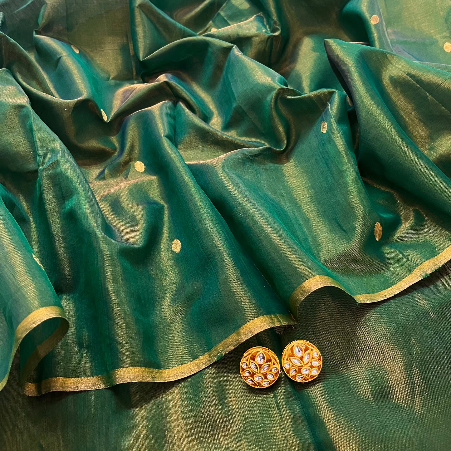 Bottle green maheshwari tissue silk saree with zari bootis all over