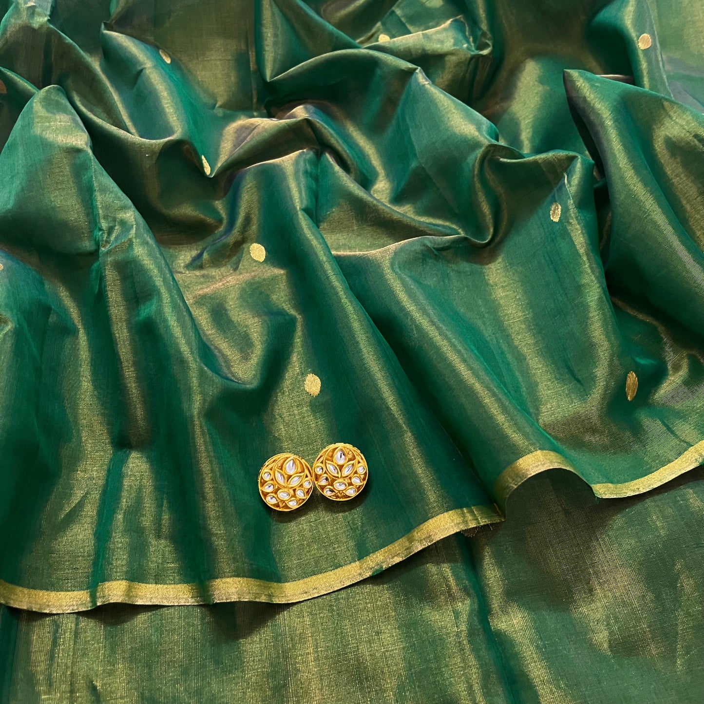 Bottle green maheshwari tissue silk saree with zari bootis all over