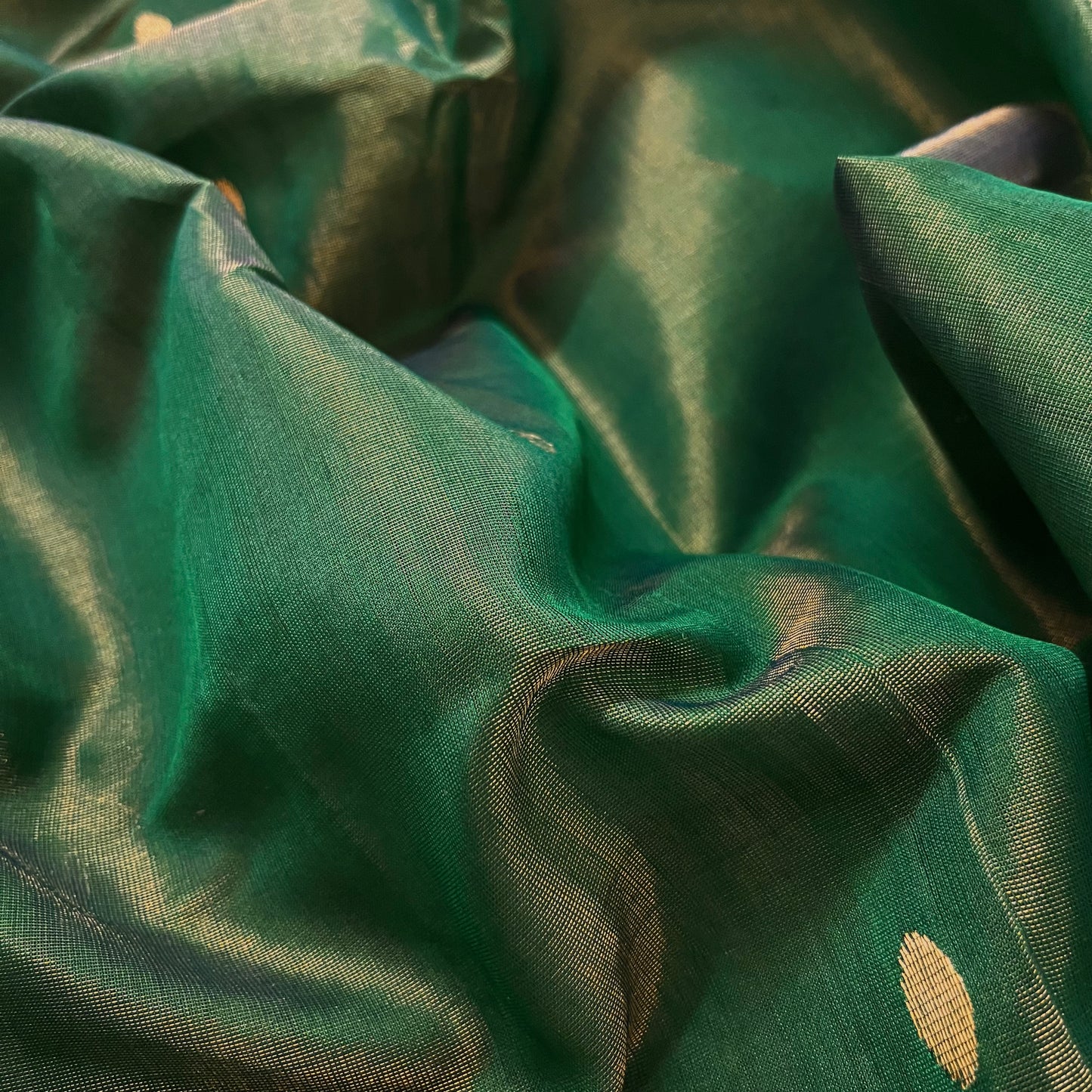 Bottle green maheshwari tissue silk saree with zari bootis all over