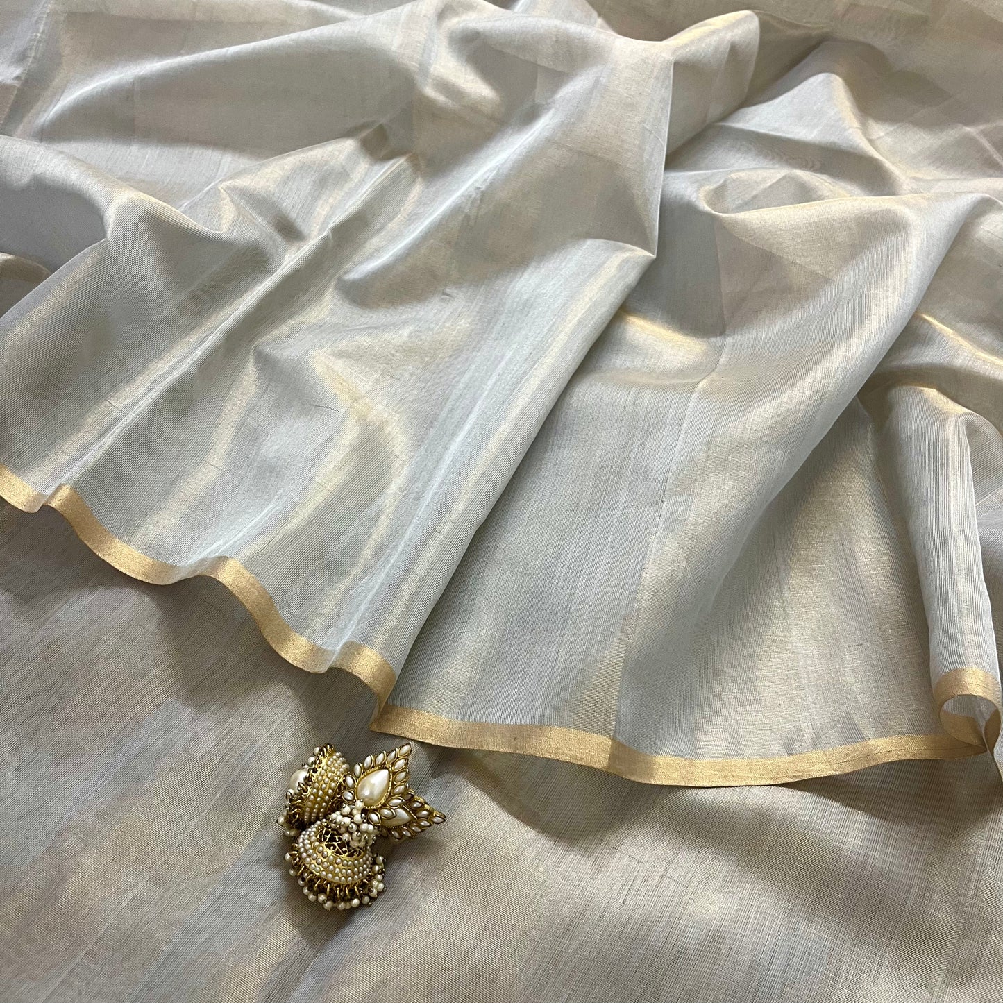 Silver Gold Maheshwari tissue silk saree with Zari lines on Pallu