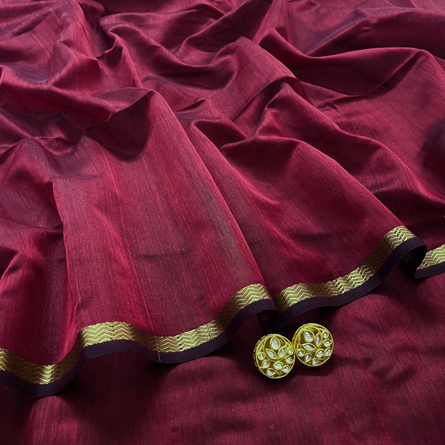 Deep maroon Maheshwari saree with jute Pallu