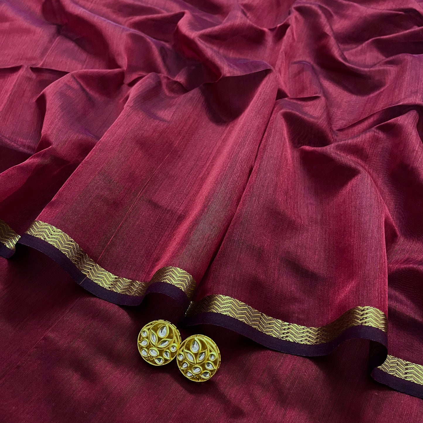 Deep maroon Maheshwari saree with jute Pallu