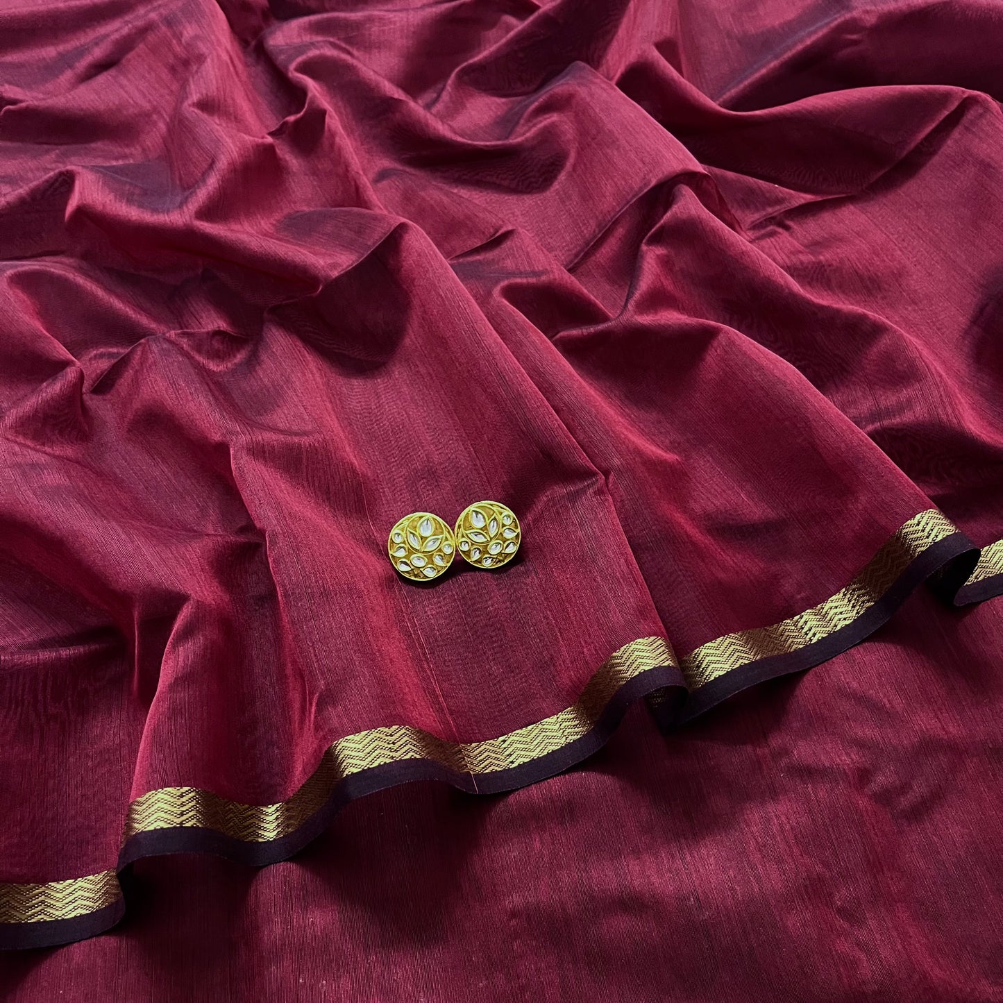 Deep maroon Maheshwari saree with jute Pallu