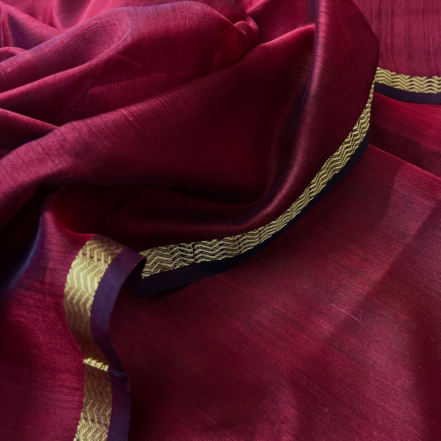 Deep maroon Maheshwari saree with jute Pallu