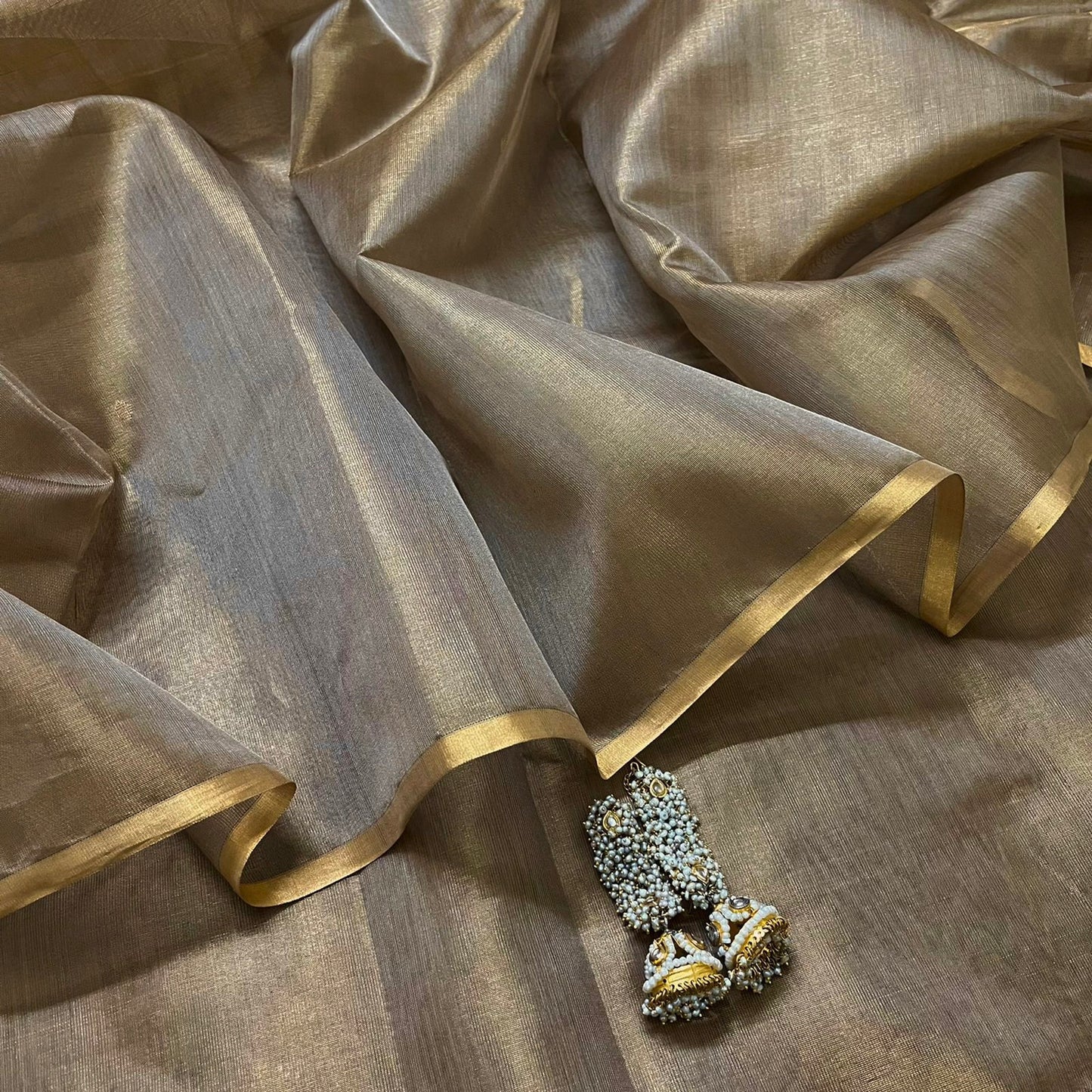 Antique gold maheshwari tissue silk saree with zari bootis all over