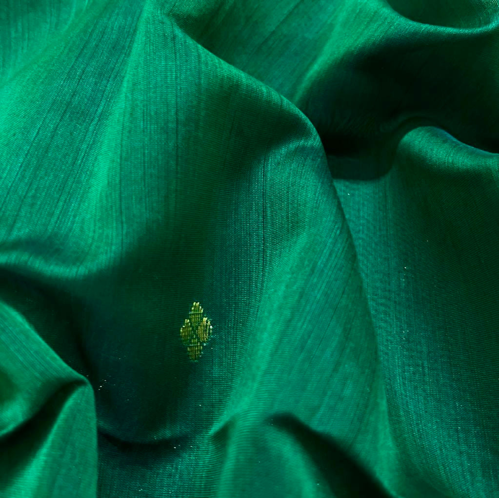 Dark green maheshwari saree with zari bootis all over