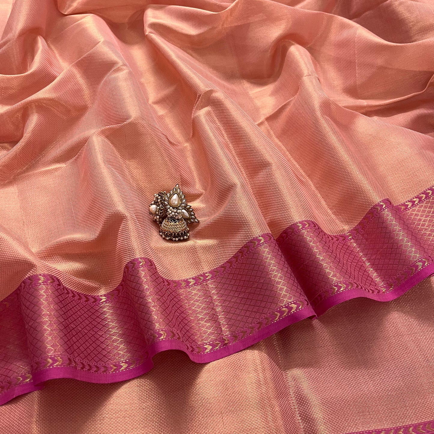 Peachish Pink Maheshwari saree with Zari pattern all over